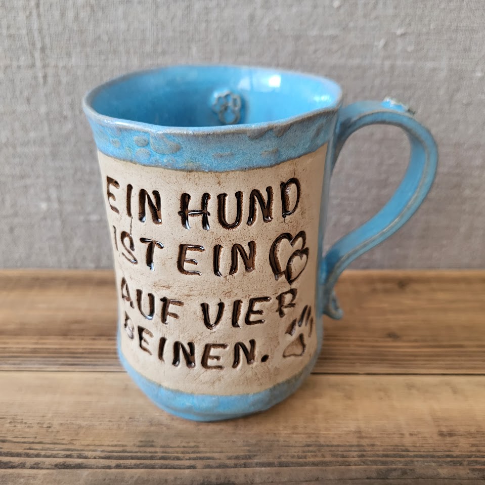 Keramiktasse "Ein Hund ist ein Herz..." türkis